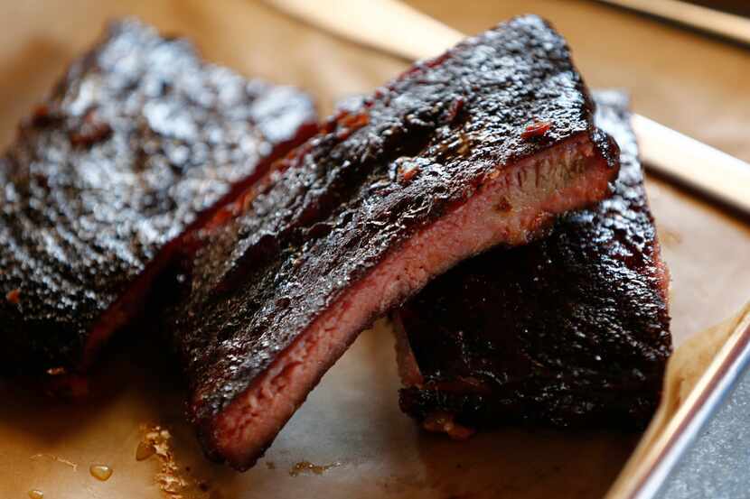 Barbecue joints like Ferris Wheelers Backyard & BBQ in Dallas will be serving smoked meat at...
