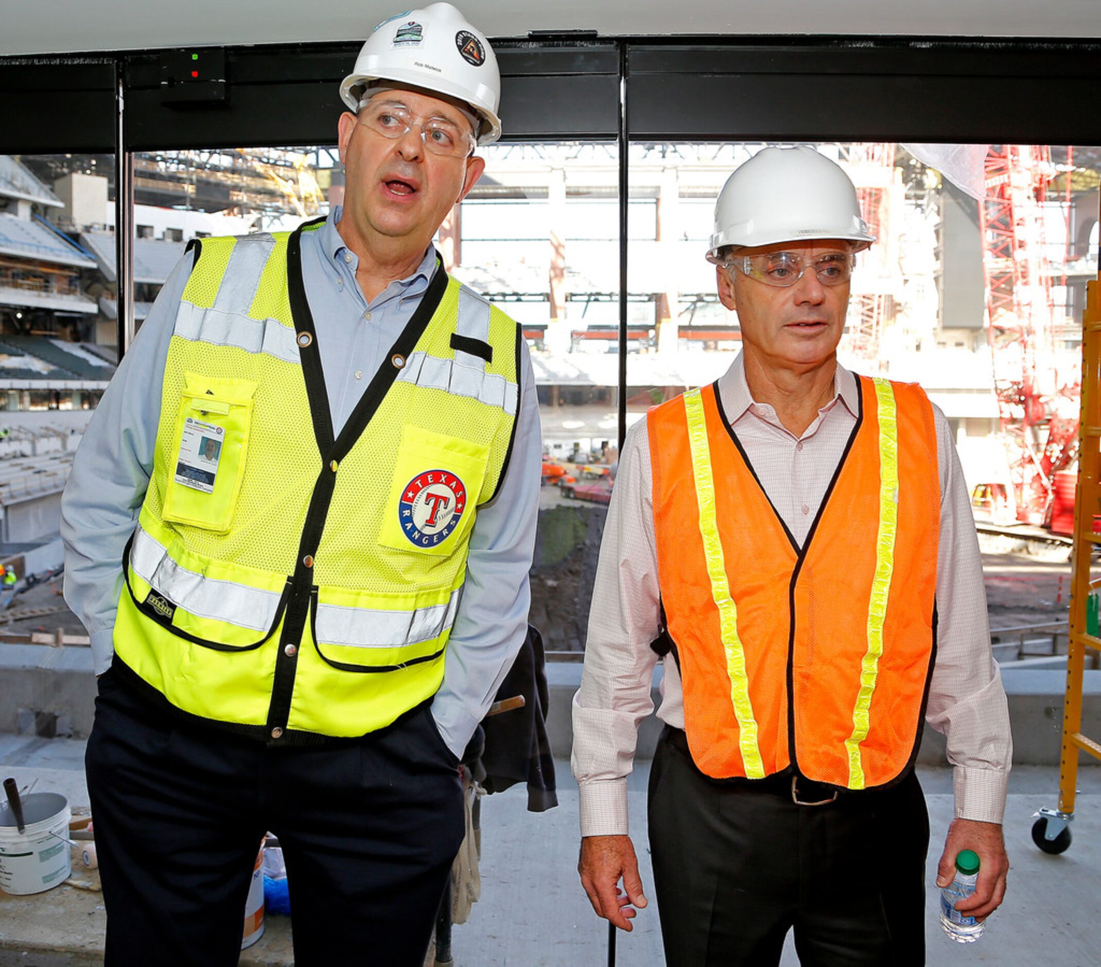 Rob Matwick (left), executive vice president of business operations for the Texas Rangers...