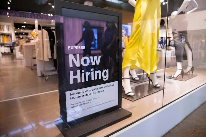 A hiring sign at the Express store at NorthPark Center in Dallas.