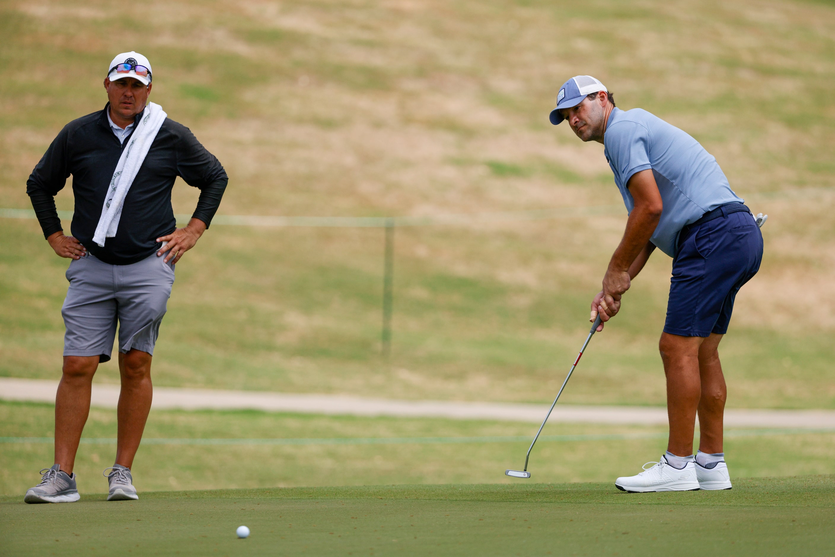 Former Dallas Cowboys quarterback Tony Romo puts on the first green during the ClubCorp...