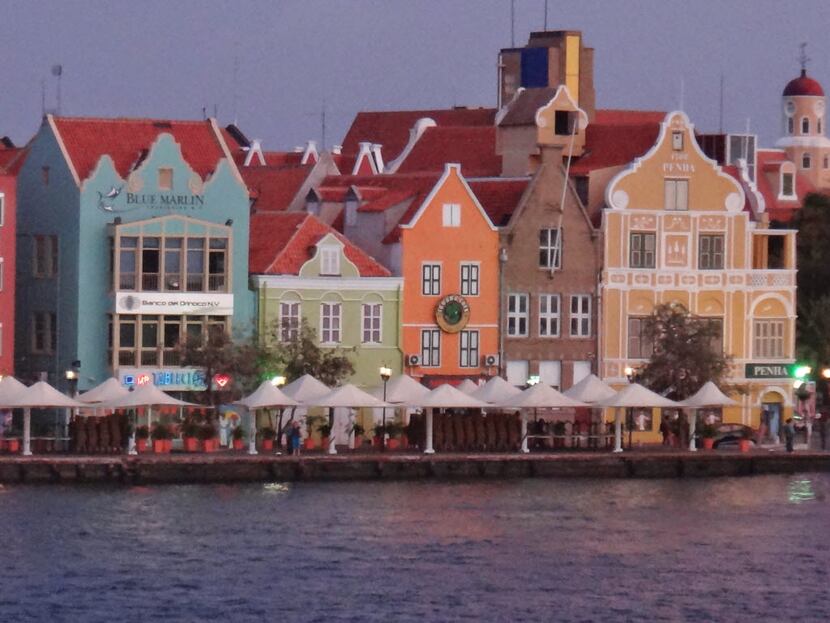 The setting sun gives the island's Dutch colonial architecture the look of a painting. 