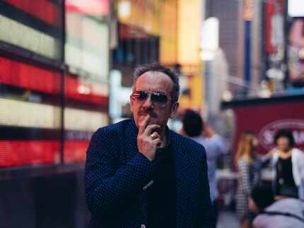 Elvis Costello at Times Square in New York, July 27, 2016. (Geordie Wood/The New York Times)