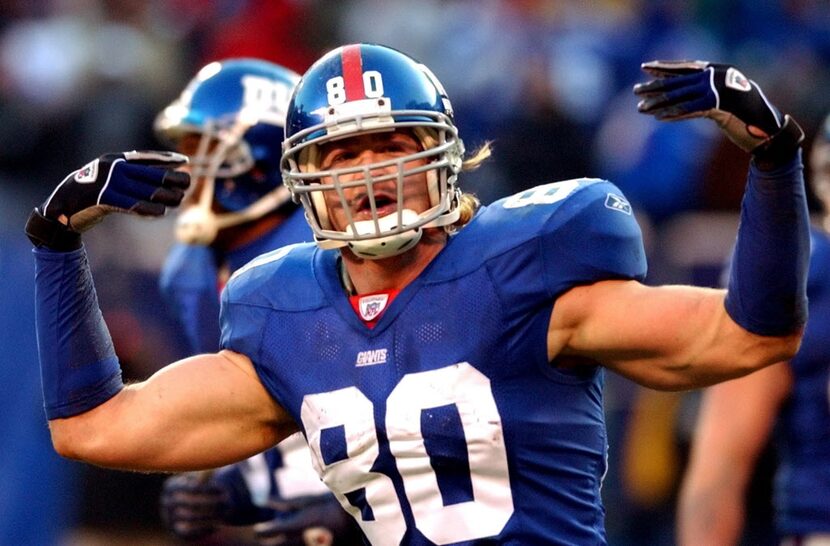 New York Giants tight end Jeremy Shockey reacts to the fans after scoring a touchdown during...