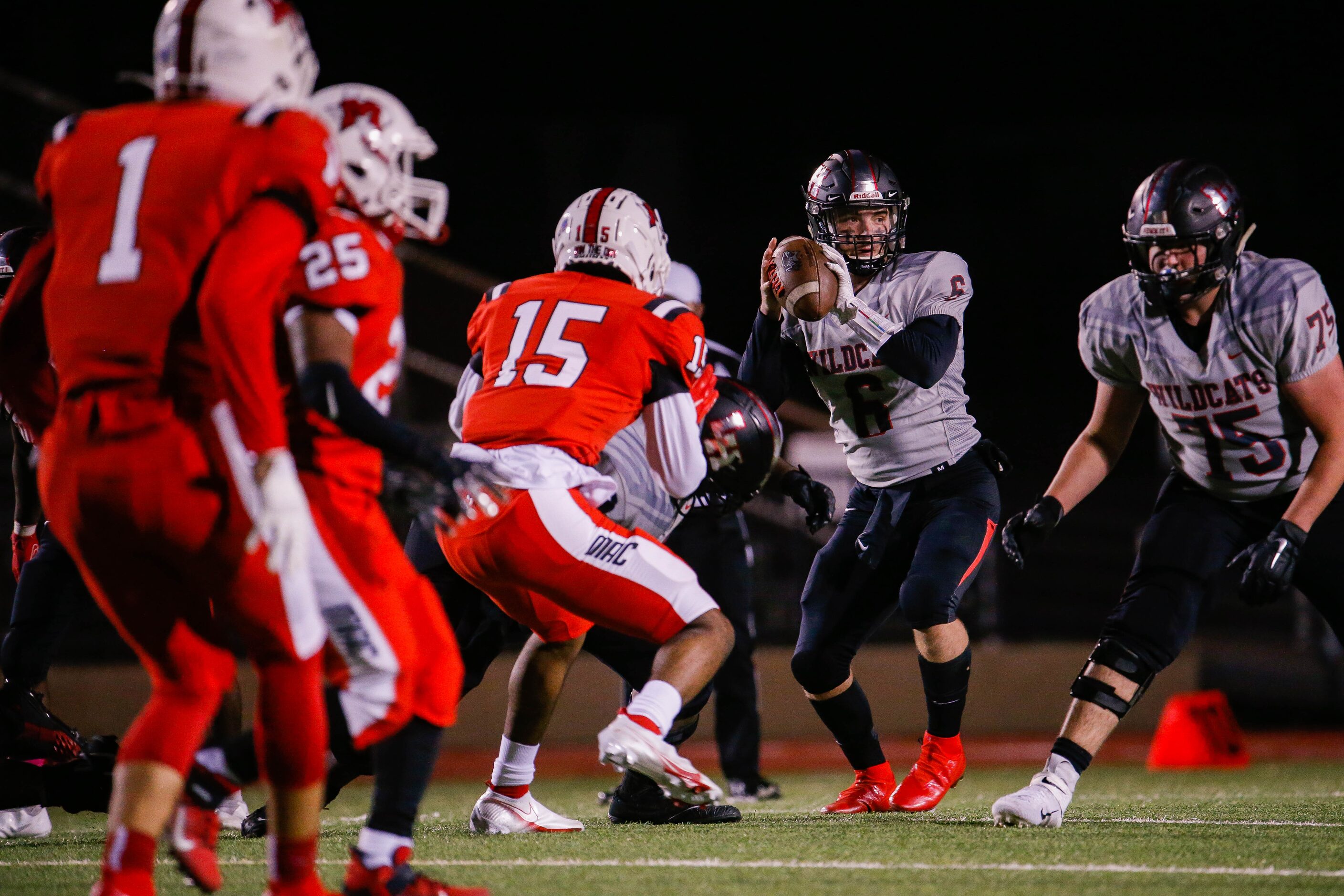 Lake Highlands quarterback Mitch Coulson (6) prepares to throw the ball during a the first...