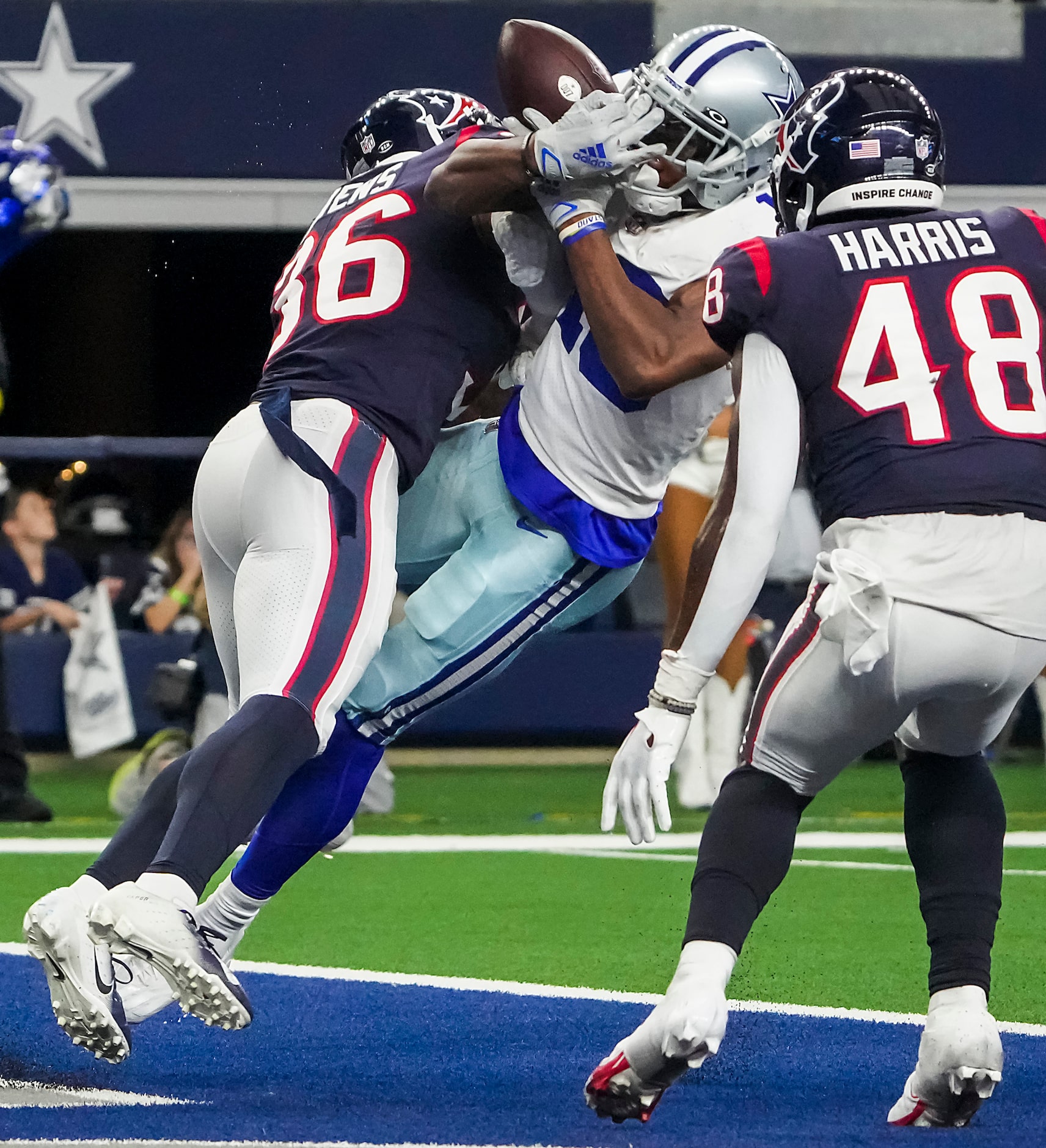 Houston Texans safety Jonathan Owens (36) breaks up a pass in the end zone intended for...