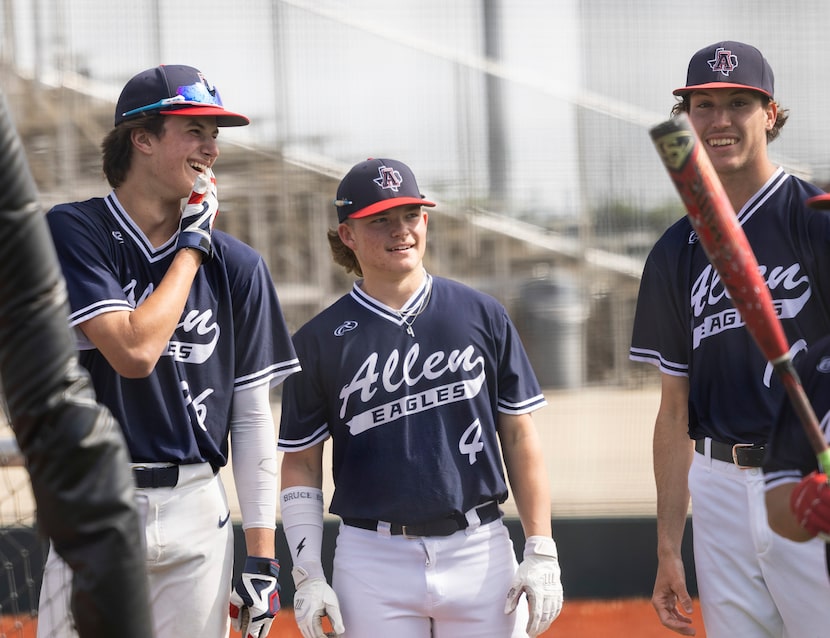 (From left) Allen baseball pitchers Chandler Hart, Brady Coe and Isaac Gammel laugh during...