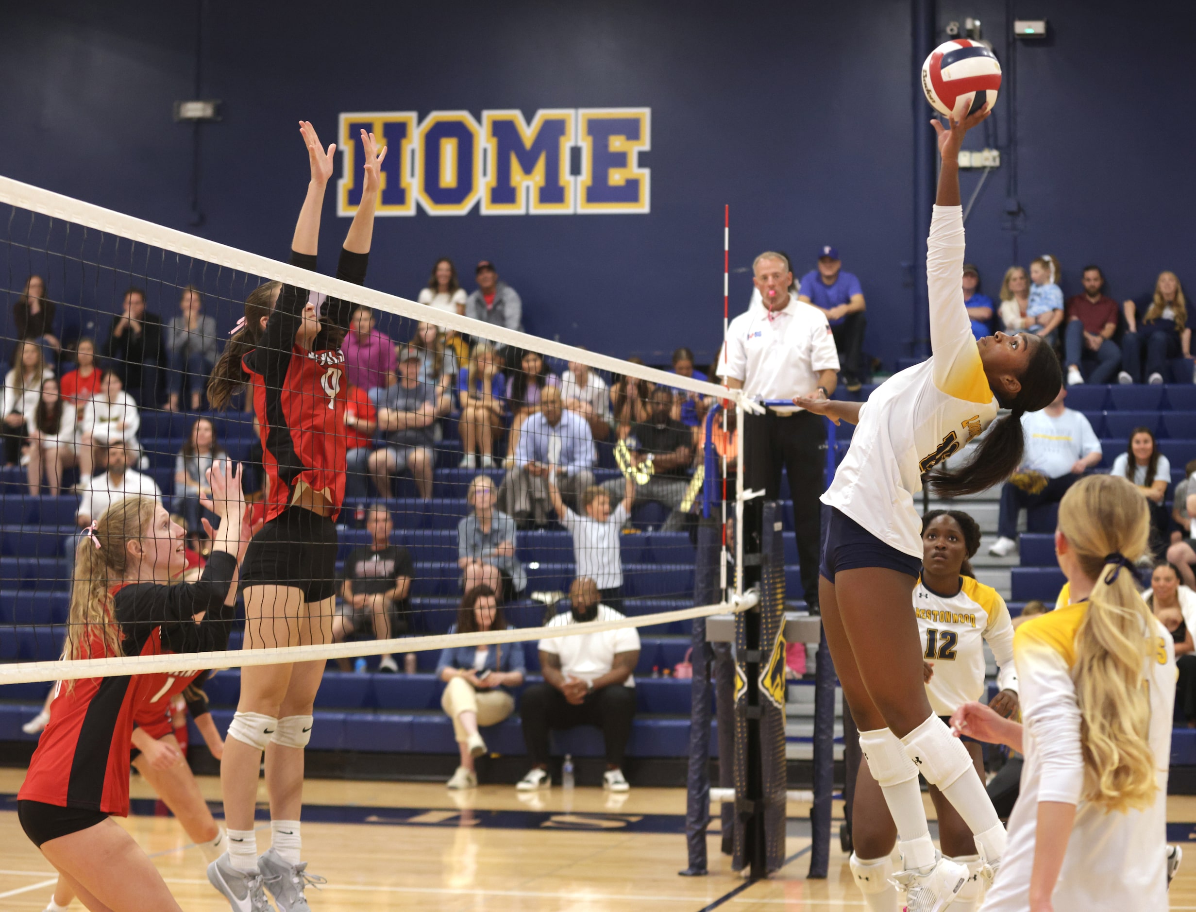 Prestonwood player #16 Taylor Clarke jumps for the ball during the Ursuline Academy of...