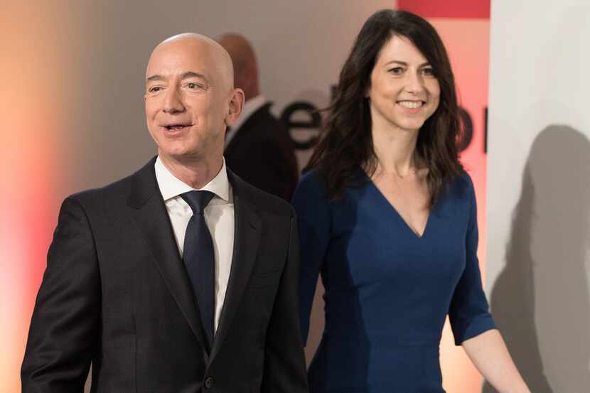 Amazon CEO Jeff Bezos and his wife MacKenzie Bezos arrive for the Axel Springer award...