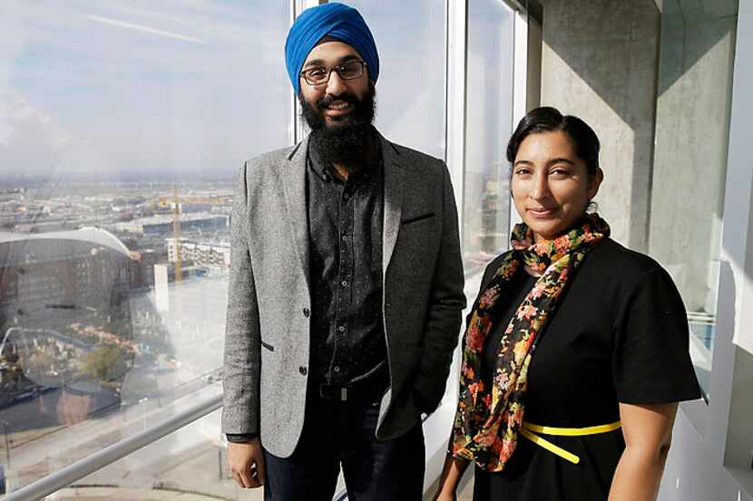 Darsh Singh and his wife, Lakhpreet Kaur, pose for a photo in his Dallas office. Singh, a...