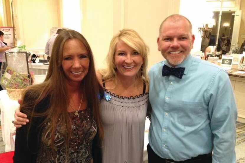 
Sarah Kammerer (left) of the DFW Humane Society, Lisa Sturgeon and Michael Whiteside at the...
