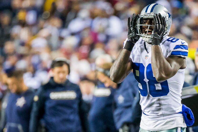 Dallas Cowboys wide receiver Dez Bryant (88) shouts encouragement to wide receiver Lucky...