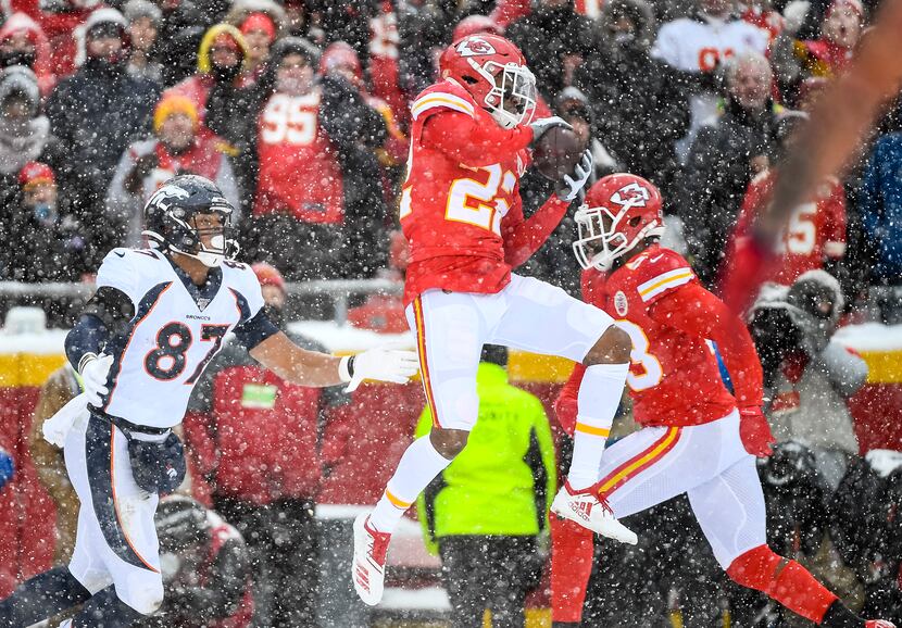 Chiefs free safety Juan Thornhill (22) intercepts a ball intended for Broncos tight end Noah...