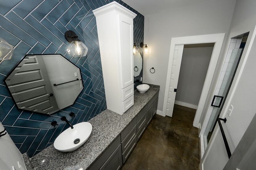 The EarnhartBuilt-designed home at 401 East Nelson in Denison includes antique blue tile and...