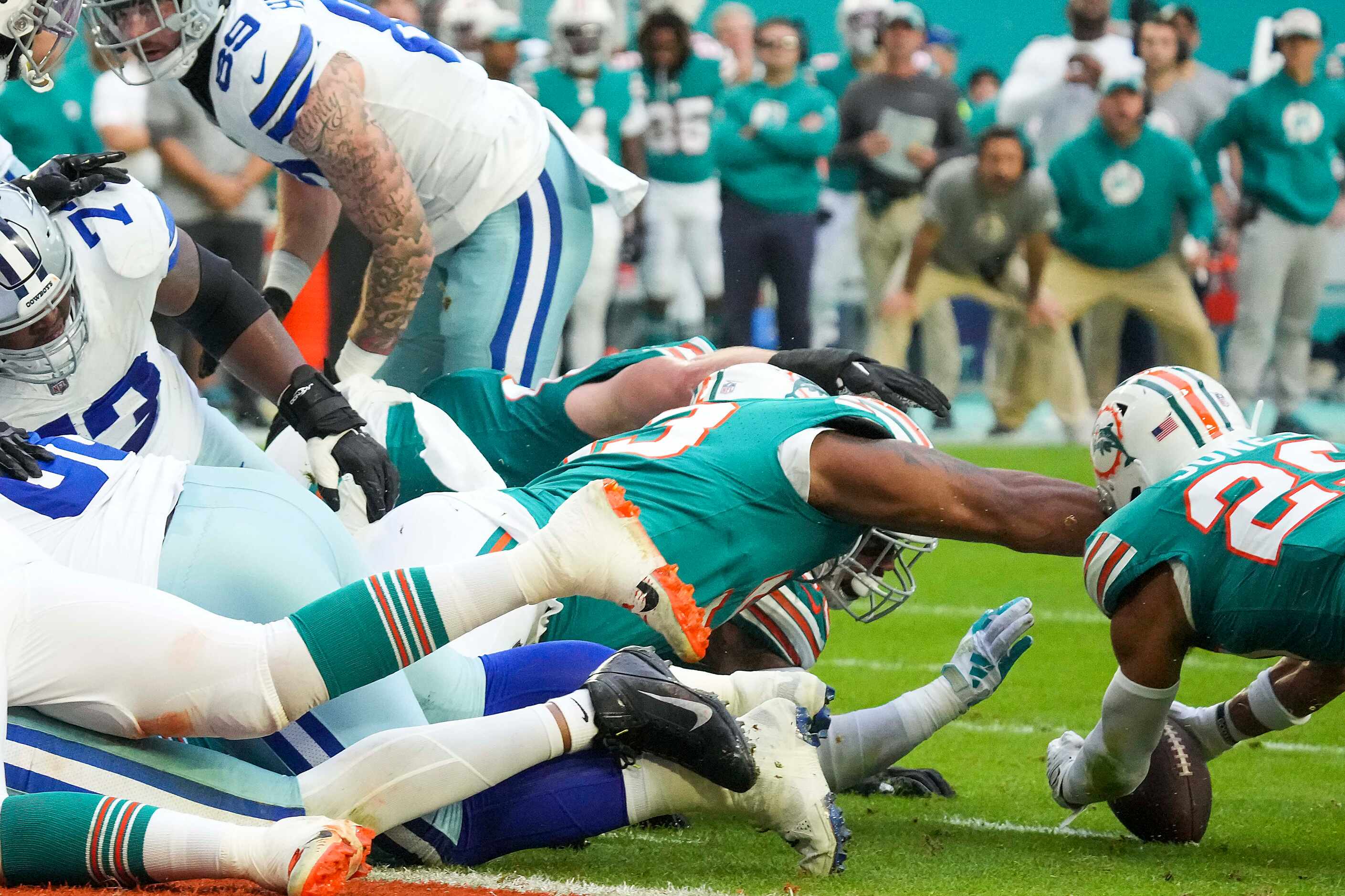 Miami Dolphins safety Brandon Jones (29) recovers a fumble by Dallas Cowboys quarterback Dak...