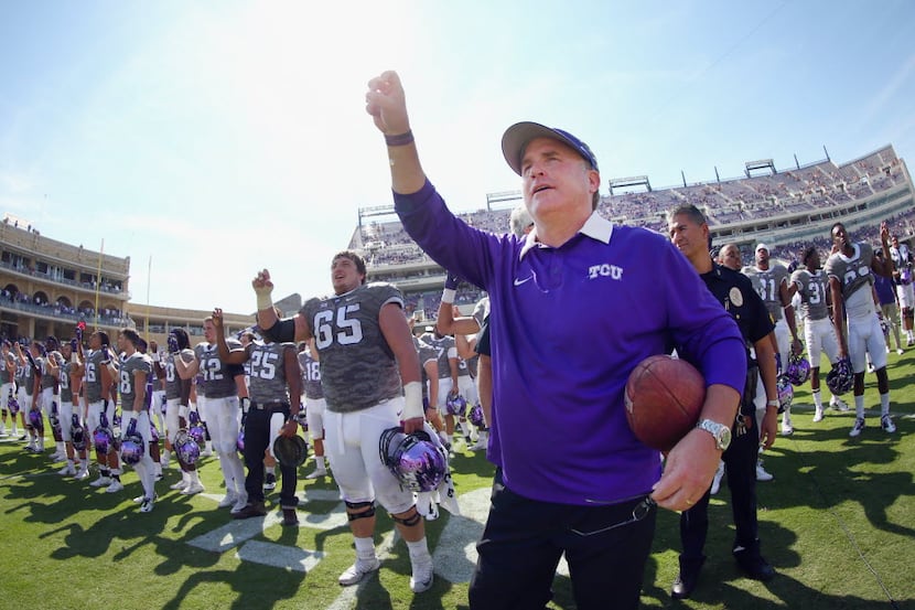FORT WORTH, TX - OCTOBER 03:  Head coach Gary Patterson of the TCU Horned Frogs celebrates...