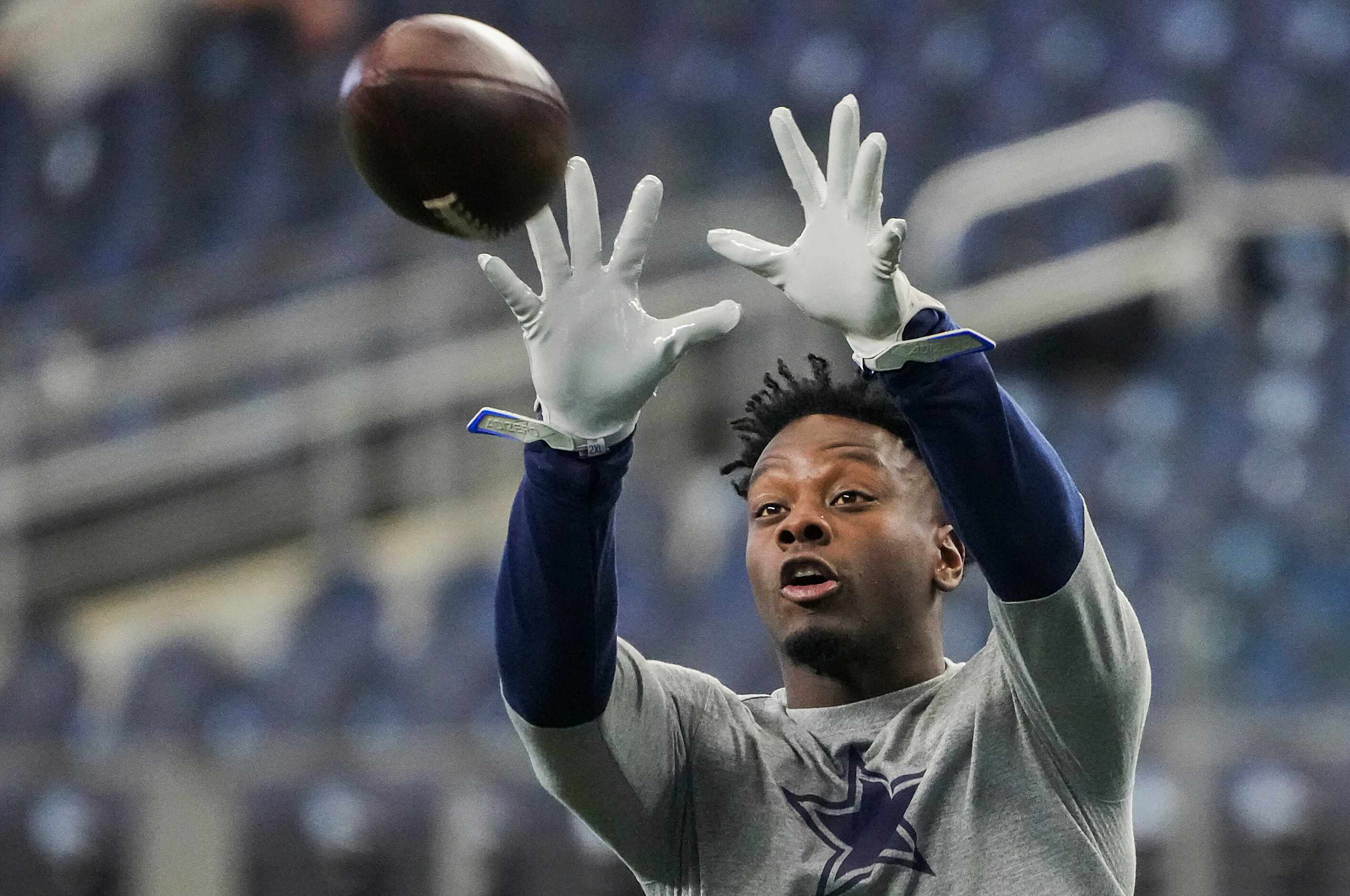 Dallas Cowboys wide receiver Michael Gallup warms before an NFL football game against the...