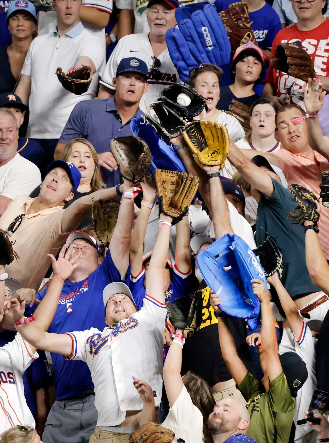 Fans in right field glamour for a home run ball by José Ramírez of the Cleveland Guardian...