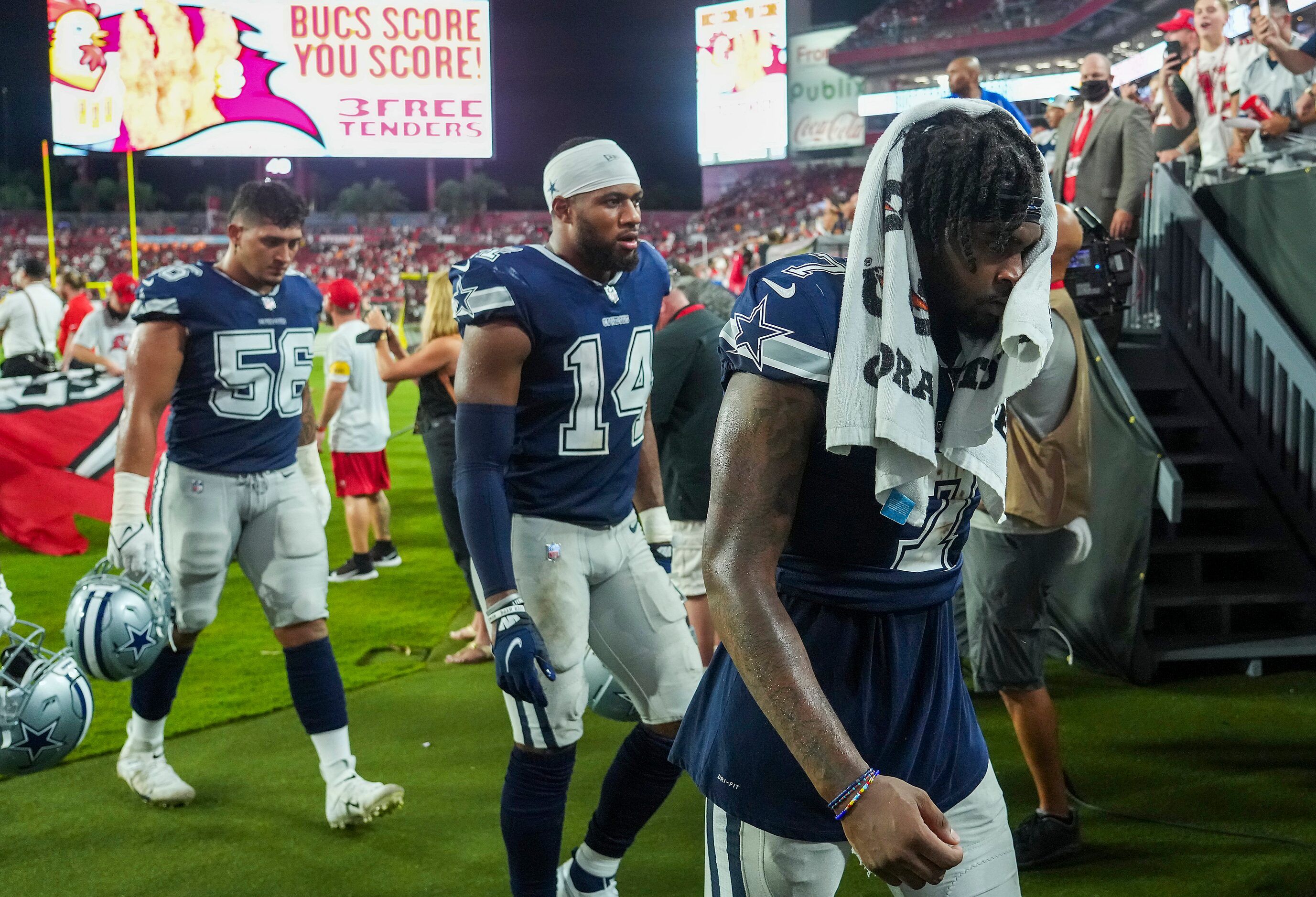 Dallas Cowboys cornerback Trevon Diggs (7), linebacker Jabril Cox (14) and defensive end...