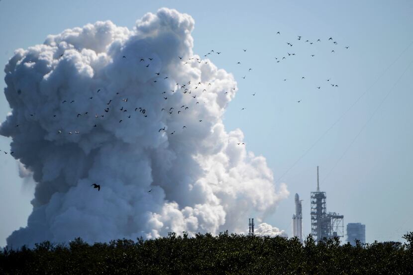 SpaceX fired up its newest, biggest rocket in a critical launch pad test Wednesday, Jan. 24,...