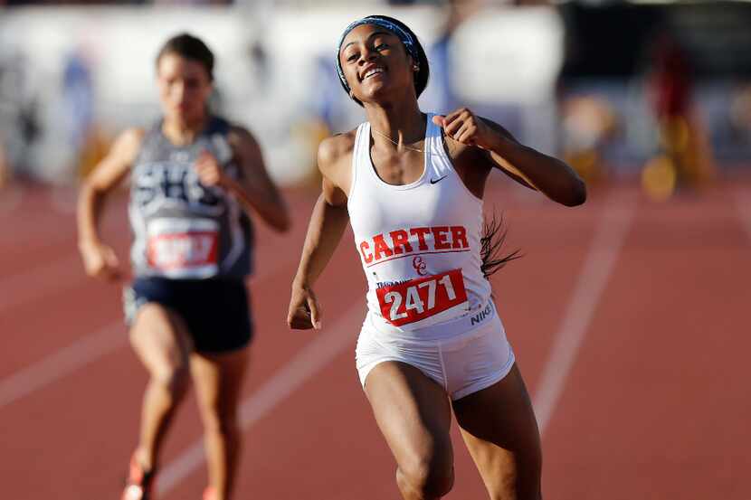 Dallas Carter's Sha'Carri Richardson (2471) finishes first in the class 5A girls 100-meter...