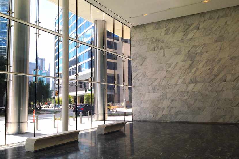 The marble-clad lobby of McKinney & Olive has a front row seat on McKinney Avenue.