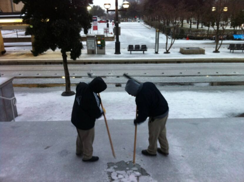 Carlos Lopez, right, and Derrick Forte, both building engineers at the Plaza of the...