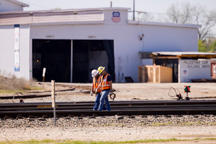 Union Pacific trackmen work at the Union Pacific Railroad rail yard on Thursday, March 28,...