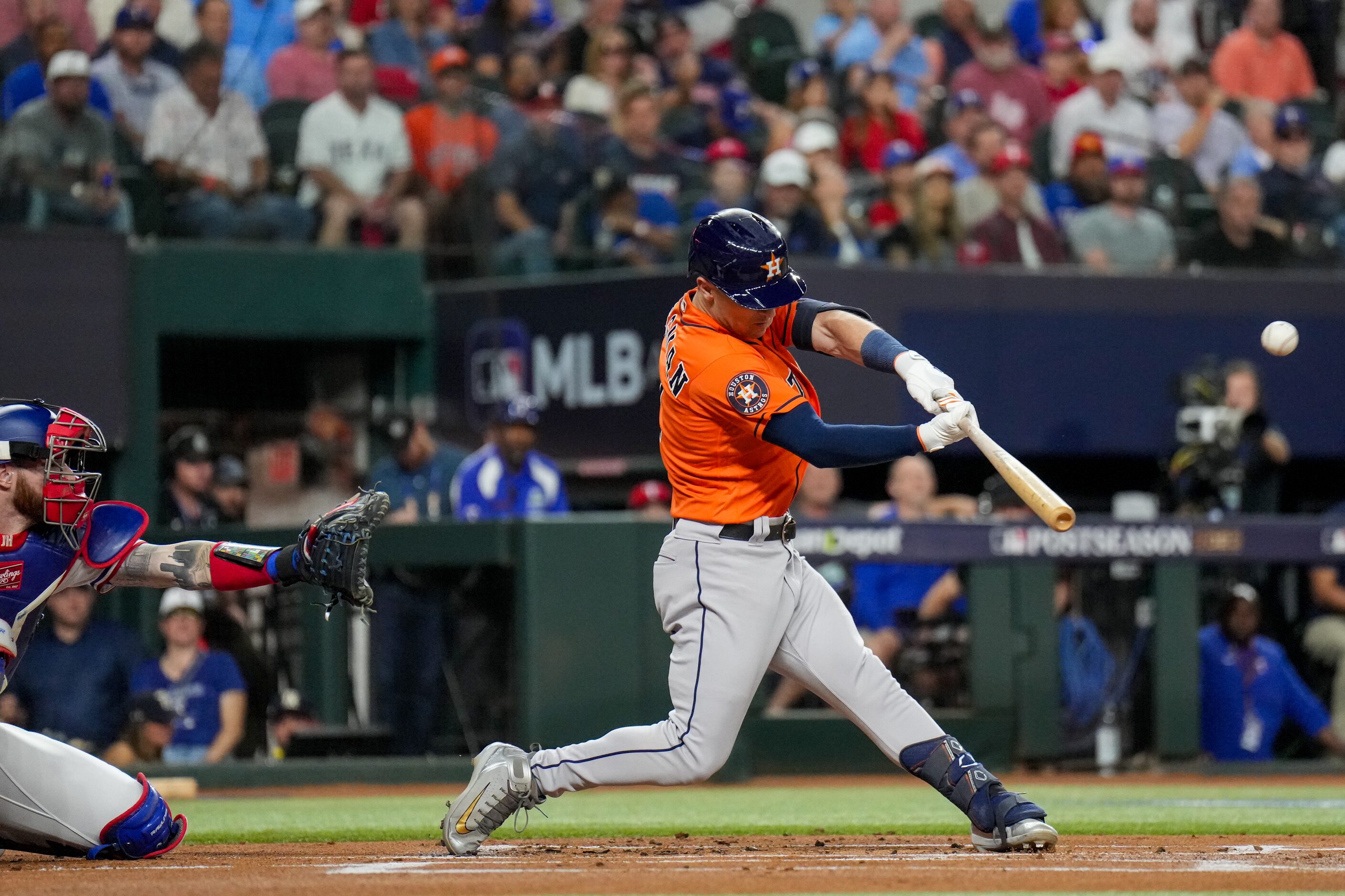 Houston Astros third baseman Alex Bregman hits a triple in the first inning against the...