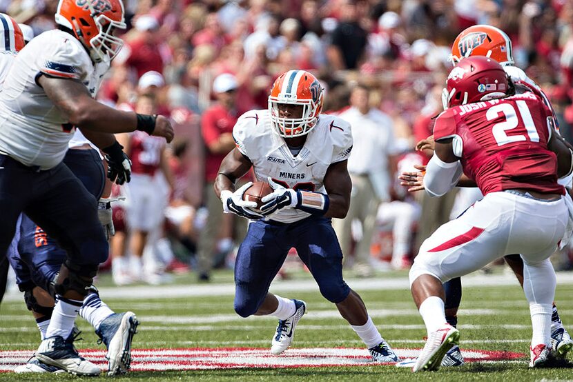 FAYETTEVILLE, AR - SEPTEMBER 5:  Aaron Jones #29 of the UTEP Miners runs the ball against...