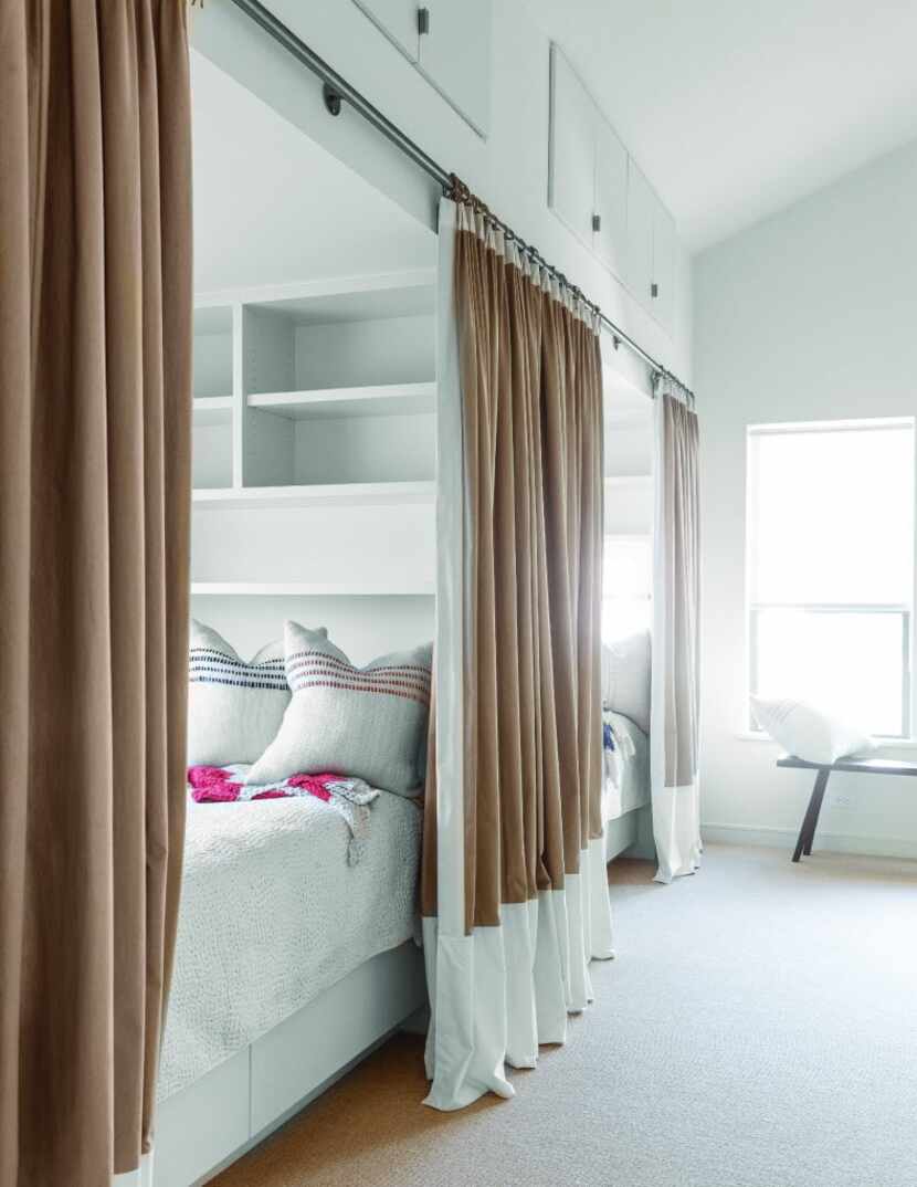 Curtains provide privacy for adults sleeping within these cozy bunks. Positioned end-to-end...