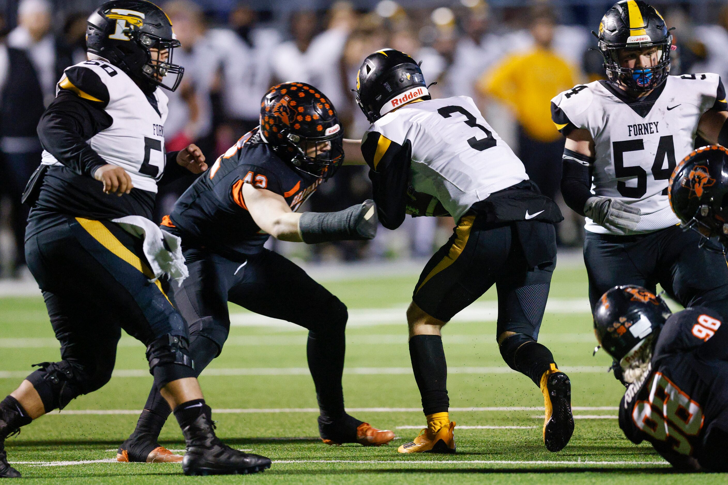 Aledo defensive tackle Jaxon Richter (43) sacks Forney quarterback Kyle Crawford (3) during...