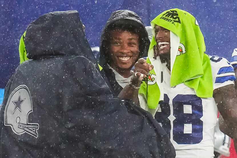 Dallas Cowboys wide receiver CeeDee Lamb (88) laughs on the bench during the second half of...