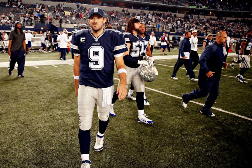 Dallas Cowboys quarterback Tony Romo (9) walks off the field following Dallas' 33-10 loss to...