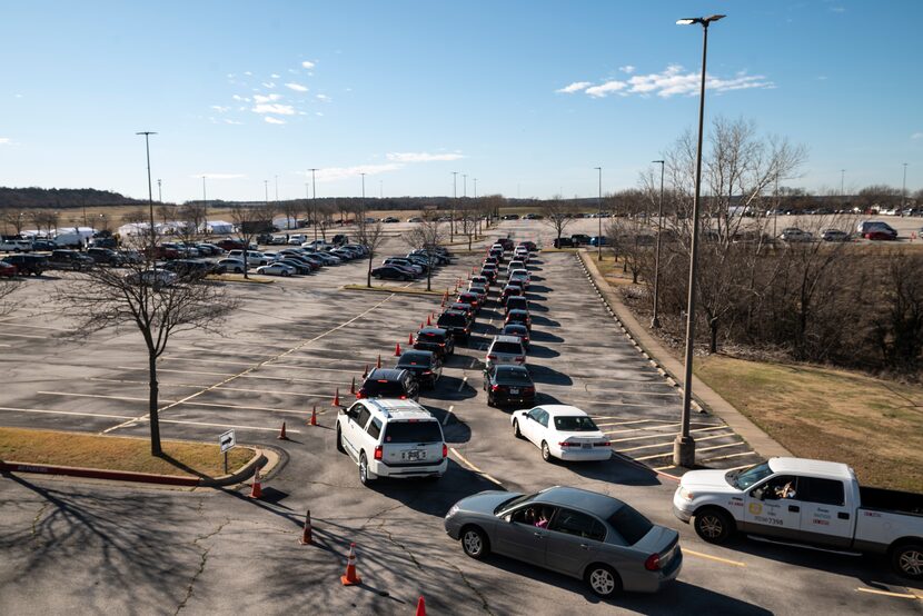 Motorists snaked their way from Keist Boulevard into the parking lots of The Potter's House...