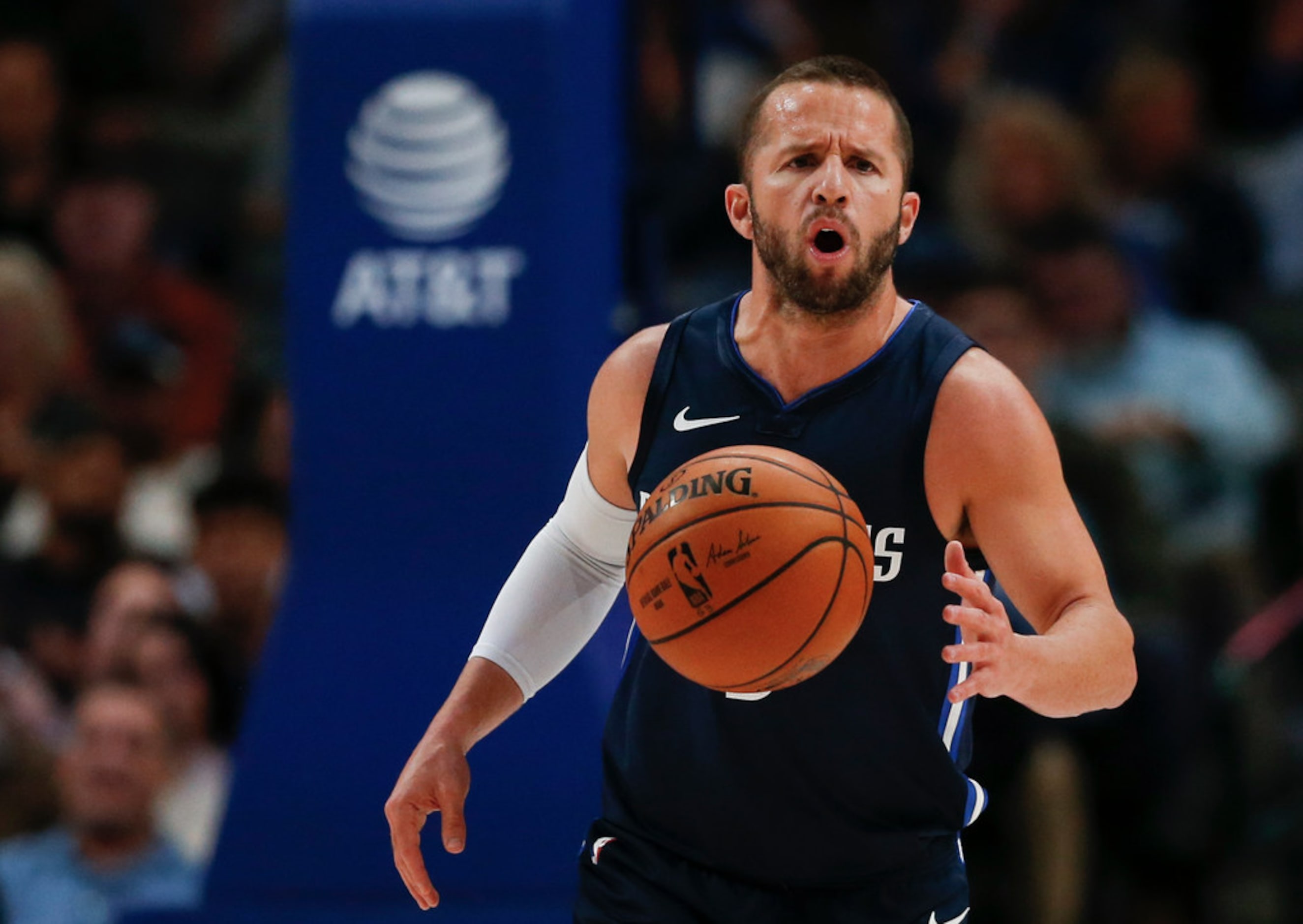 Dallas Mavericks guard J.J. Barea (5) brings the ball down during the second quarter of an...