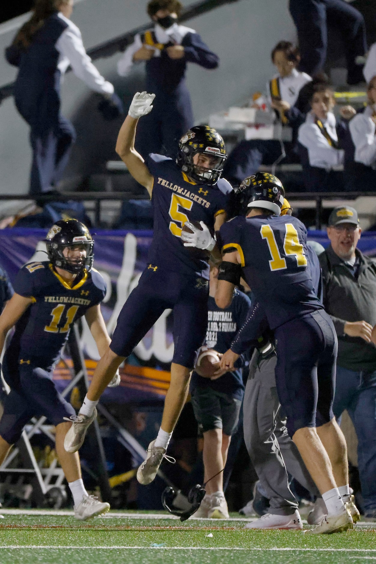 Stephenvill’s Ben Kirbo (5) celebrates his interception for a touchdown against Melissa with...