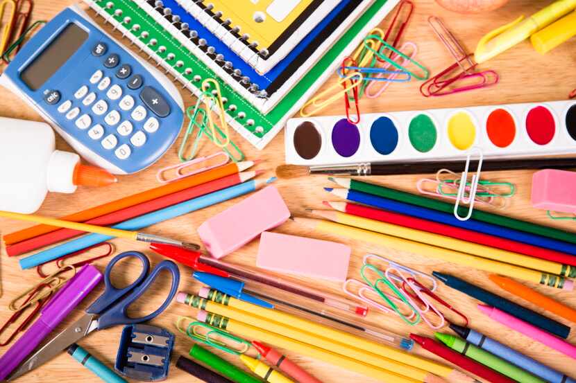 It's back to school time!  A large pile of elementary school supplies including: notebooks,...