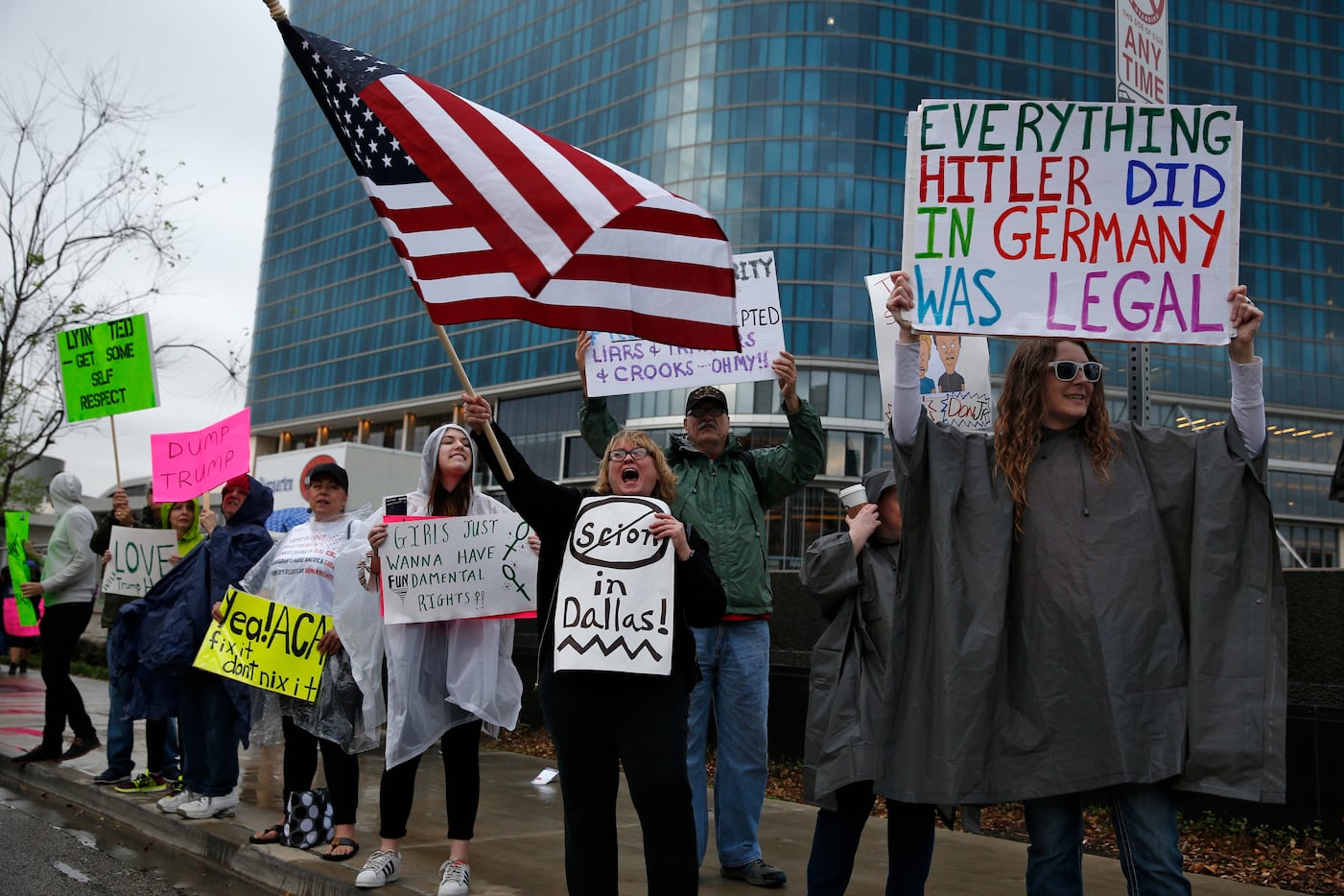Protesters line up outside the Dallas County Republican Party's Reagan Day Dinner at the...