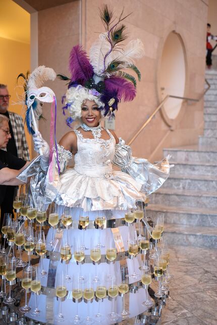 At the Fort Worth Food + Wine Festival, Rasheda Fadeyi served wine from a tiered skirt....