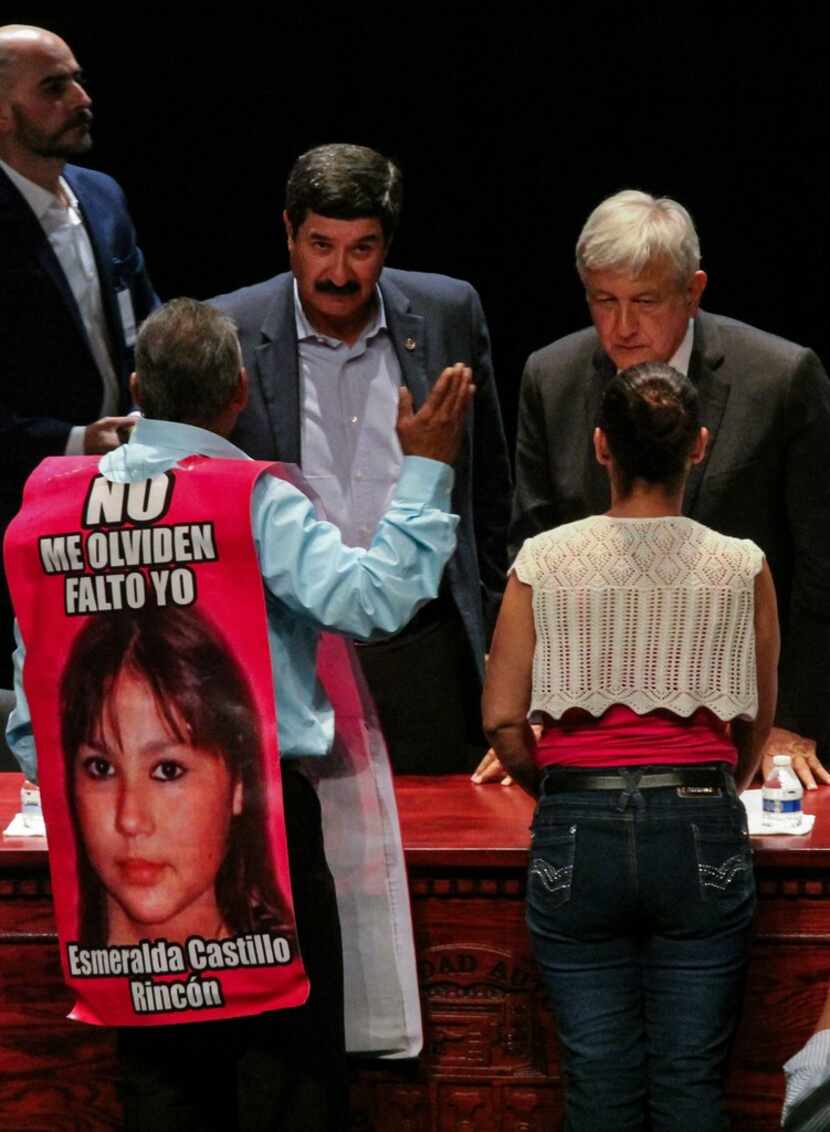 Relatives of violence victims speak with Mexican President-elect Andres Manuel Lopez Obrador...