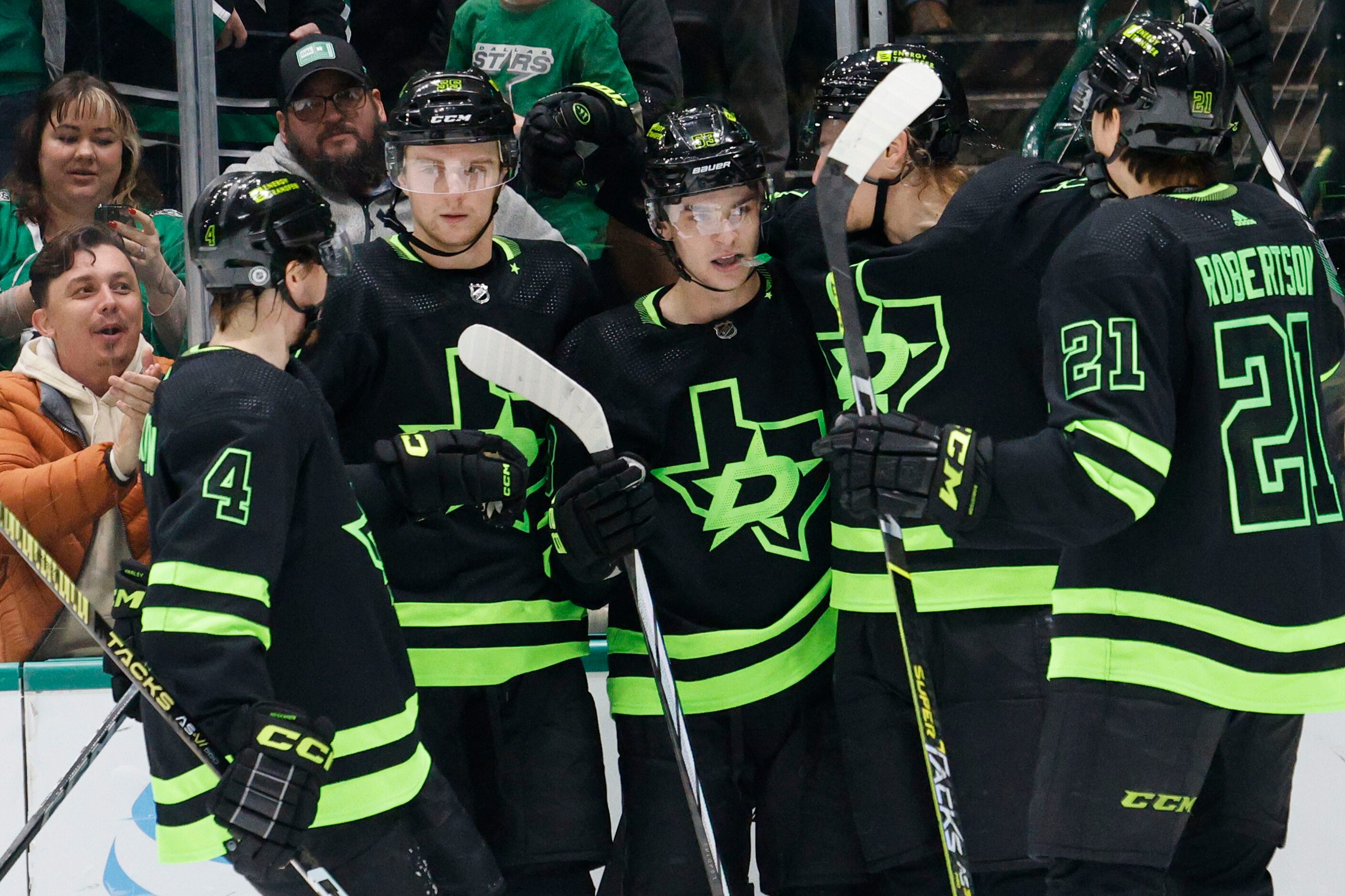 Dallas Stars center Wyatt Johnston (53), center, celebrates with his teammates Dallas Stars...