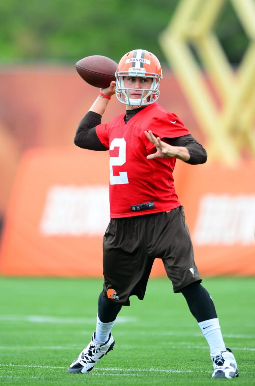 May 28, 2014; Berea, OH, USA; Cleveland Browns quarterback Johnny Manziel (2) throws a pass...