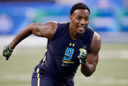 INDIANAPOLIS, IN - MARCH 05: Defensive lineman Taco Charlton of Michigan participates in a...