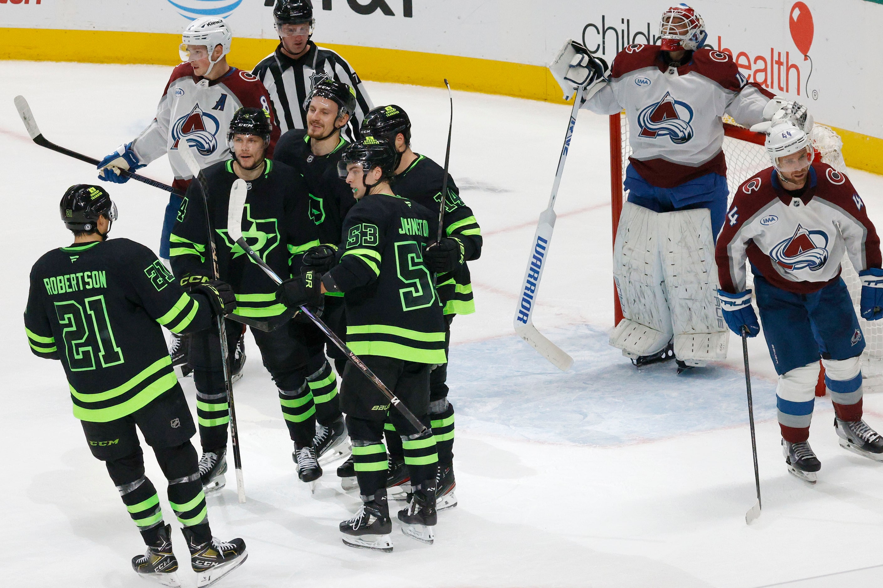 Dallas Stars center Roope Hintz (24), third from left, celebrates with his teammates after...