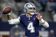 Dallas Cowboys quarterback Dak Prescott (4) throws a pass during the first half of an NFL...