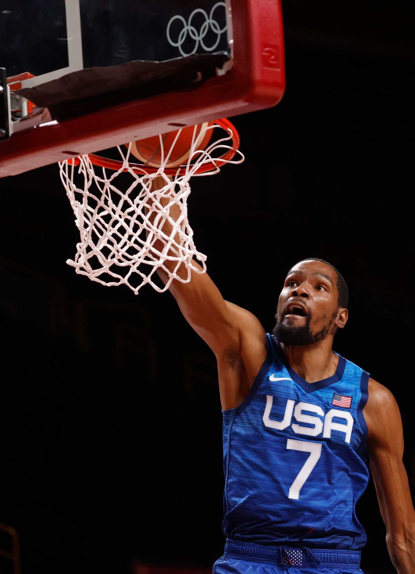 USA’s Kevin Durant (7) dunks in a game against Spain during the first half of a quarterfinal...