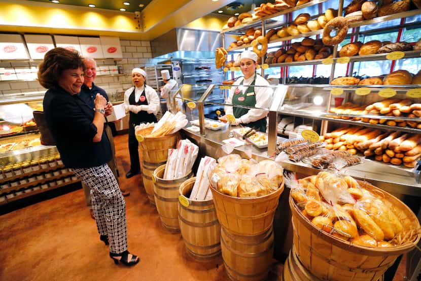 Guests check out the bakery department of Eatzi's. The new shop opened May 11 in Fort Worth.