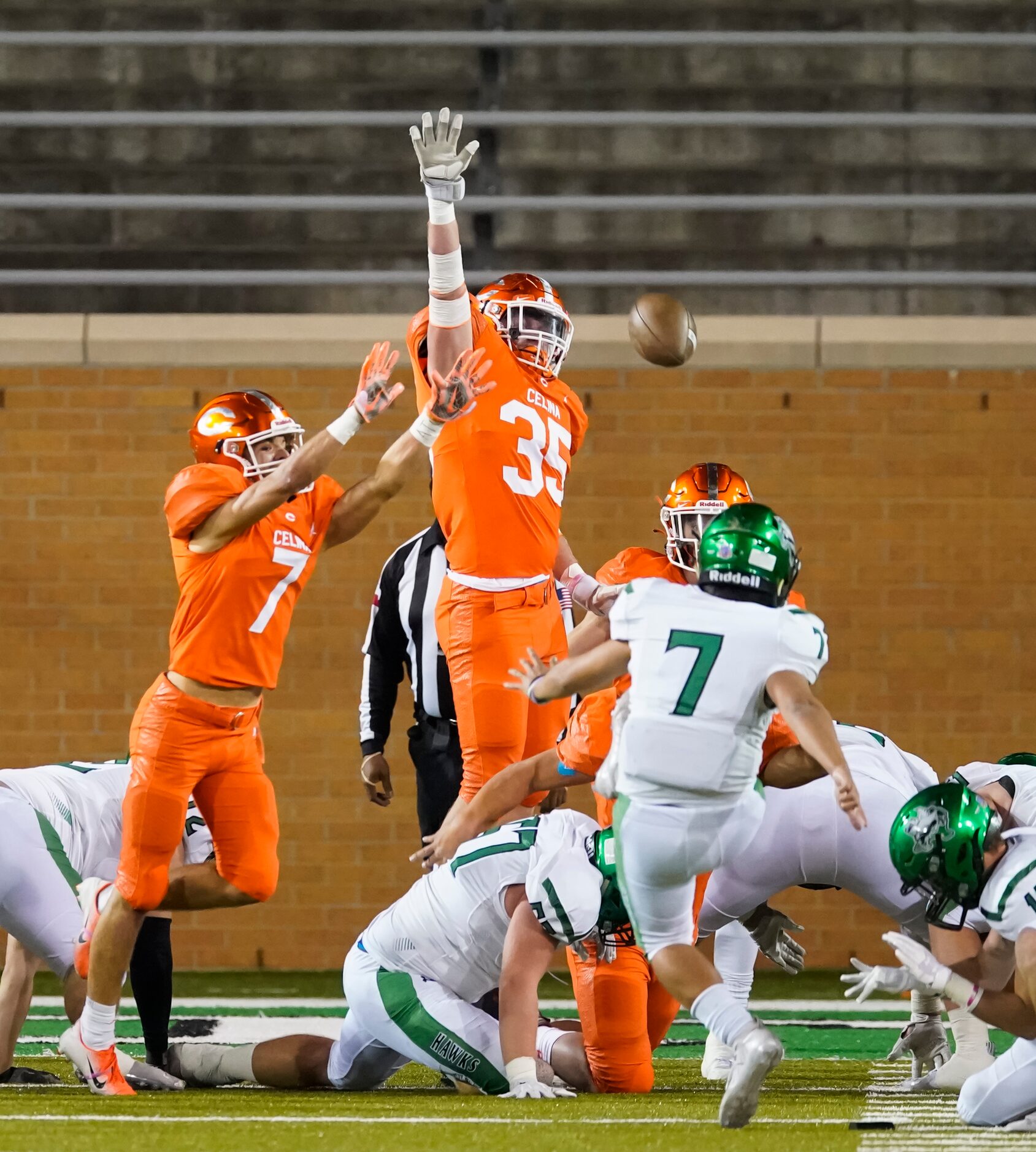 Iowa Park kicker Mason Rousseaux (1) connects for a field goal over Celina’s Wyatt Stephens...