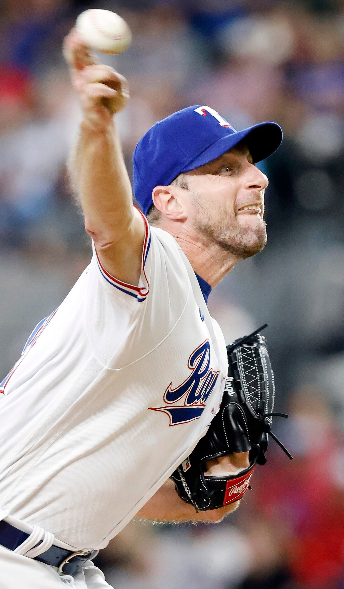 Texas Rangers starting pitcher Max Scherzer (31) throws against the Chicago White Sox during...