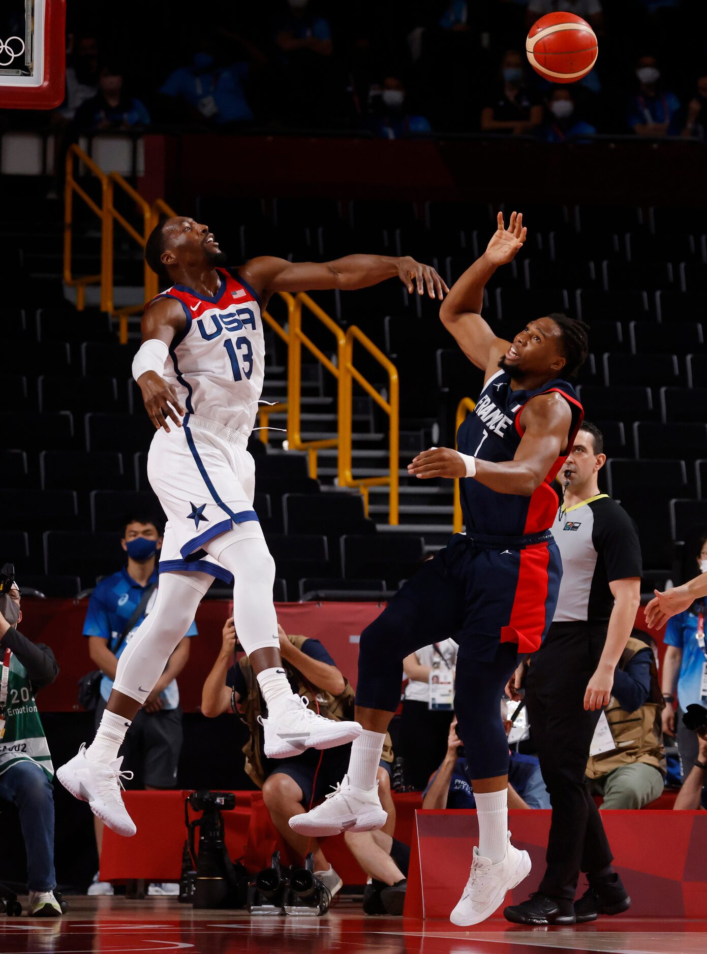 USA’s Bam Adebayo (13) blocks a shot from France’s Guerschon Yabusele (7) during the first...